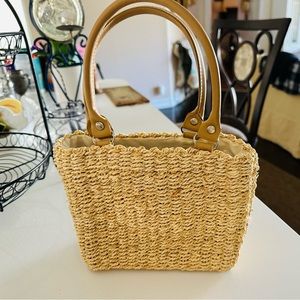 Small woman’s boho straw purse